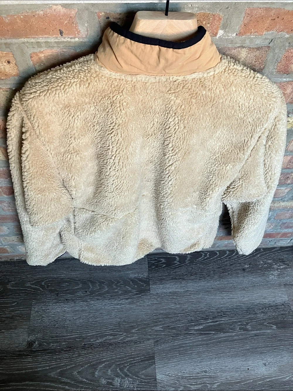 The North Face Extreme Pile Pullover in an almond butter/tan colorway